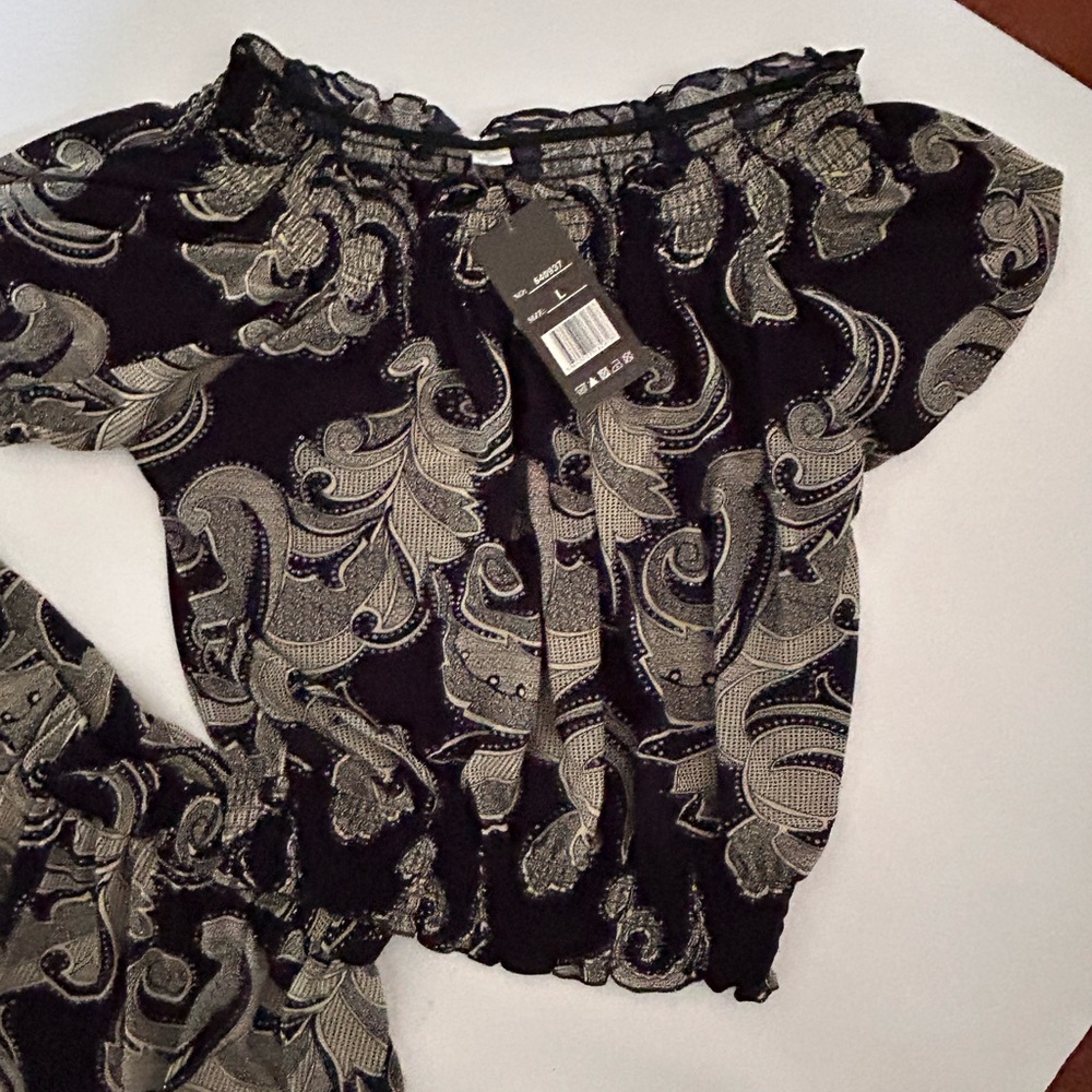 2 piece pants and top wear. New never worn.